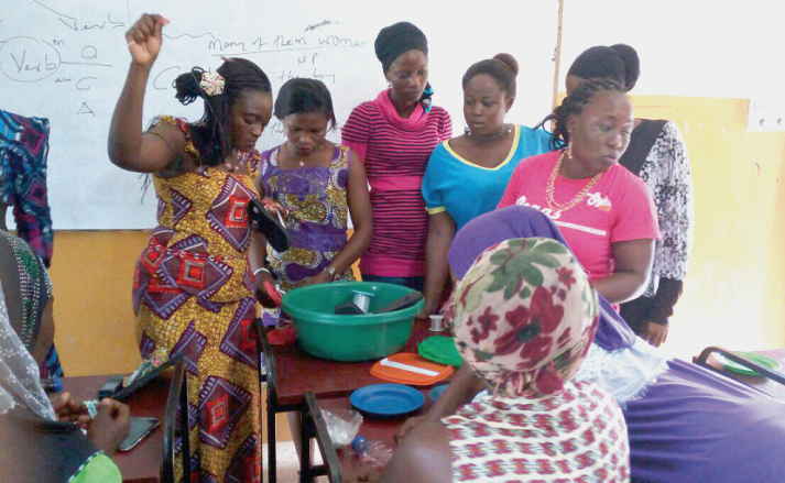 Mrs Barbara Osei Fordjour Konadu (left), the marriage counsellor looks on while some students do practical lessons during the UCC Women's Commission seminar Mrs Barbara Osei Fordjour Konadu (left), the marriage counsellor looks on while some students do practical lessons during the UCC Women's Commission seminar
