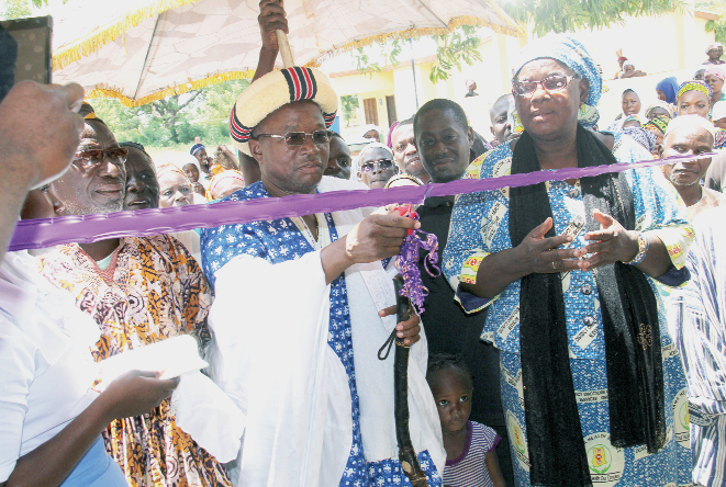The Chief of Kasuliyili, Naa Yakubu Bukari (middle), cuts the tape to inaugurate the ward. (INSET) The front view of ward The Chief of Kasuliyili, Naa Yakubu Bukari (middle), cuts the tape to inaugurate the ward. (INSET) The front view of ward