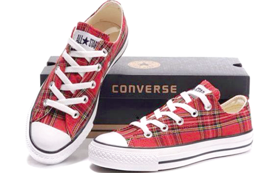 Tartan is a pattern consisting of criss-crossed horizontal and vertical bands in multiple colours Tartan is a pattern consisting of criss-crossed horizontal and vertical bands in multiple colours