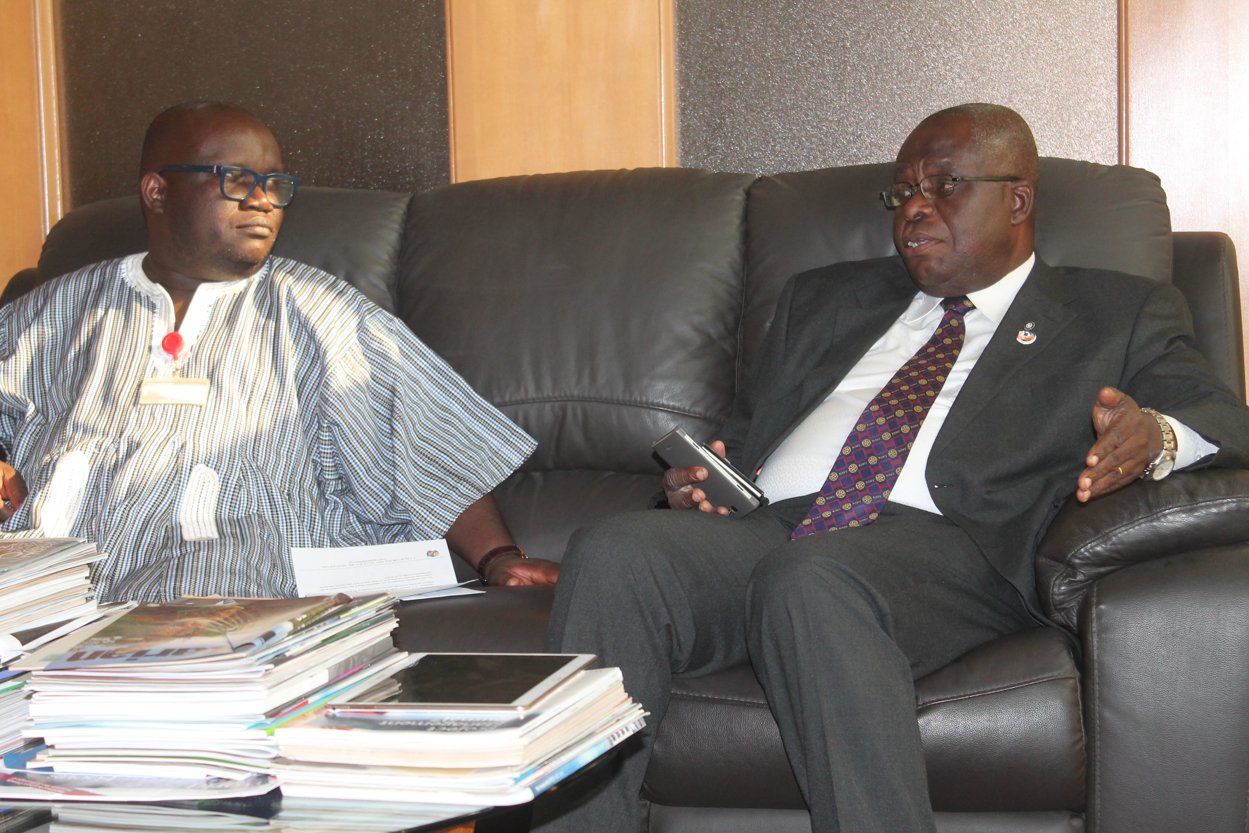 Mr Sam Worentetu (right), District Governor of Rotary District 9102, explaining a point to Mr Kenneth Ashigbey (left), Managing Director, GCGL, during the ceremony. Picture: EDNA ADU-SERWAA Rotary Club to launch campaign on time management