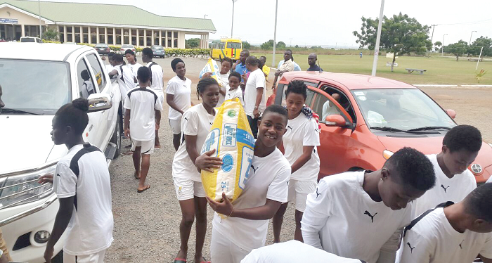 Some of the Maidens carrying the items to their camp Some of the Maidens carrying the items to their camp