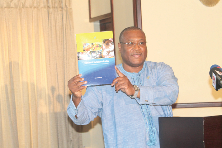 Mr Alexander Segbefia, the Minister of Health, launching the National Nutrition Policy at the ceremony. Picture: EDNA ADU-SERWAA Mr Alexander Segbefia, the Minister of Health, launching the National Nutrition Policy at the ceremony. Picture: EDNA ADU-SERWAA
