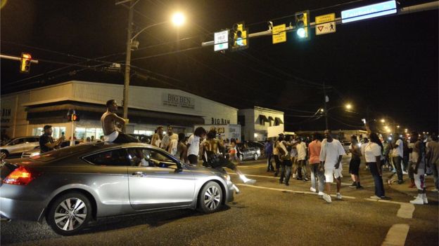 A road junction near the scene of the shooting was briefly blocked by protesters US protests after police shooting of black man in Louisiana