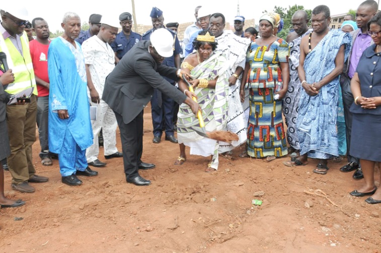 Mr Justice Dennis Dominic Adjei (with shovel) and Naa Atwei Osantro I, Queenmother of Frafraha, cutting the sod the to symbolise the commencement of the project Adentan Assembly to construct court complex to facilitate justice delivery
