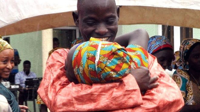 The girls were welcomed by their relatives in a ceremony in Abuja Freed Chibok girls reunite with families