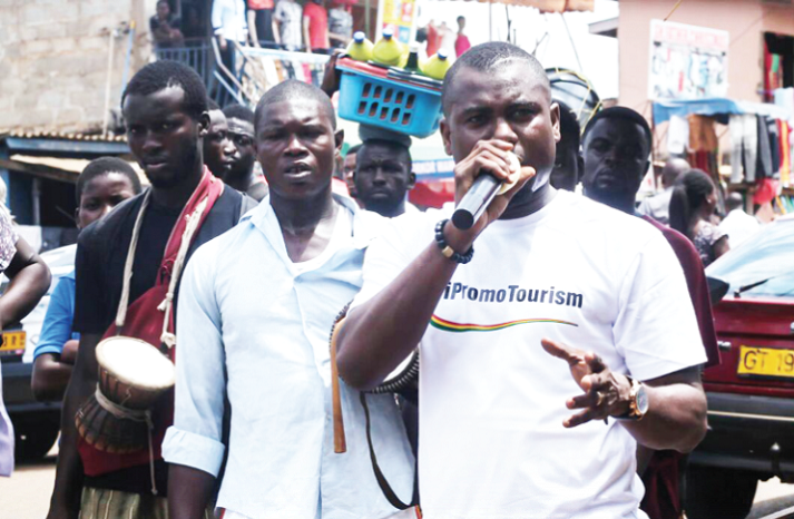 Abeiku Santana on one of his tourism promotion rounds at a taxi station. Abeiku Santana on tourism drive