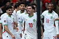 Morocco’s Brahim Díaz celebrates with teammates following the quarter-final win over Cameroon