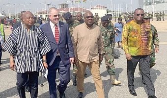 President John Dramani Mahama (2nd from right);  Samuel Okudzeto Ablakwa (left), Foreign Affairs Minister;  Rolf Olson (2nd from left), the Charge d’Affaires of the US Embassy,  and Ernest Brogya Genfi (right),  Deputy Minister of Defence, seeing the soldiers off