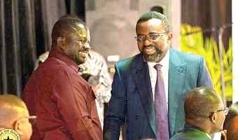 Dr Johnson Pandit Asiama (right), Governor, Bank of Ghana, interacting with Albert Kwabena Dwumfour (left), President, GJA, at the inaugural Governor's New Year Media Engagement