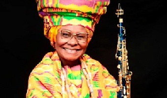 •Her iconic kente headwear has become a distinctive aspect of her public image.