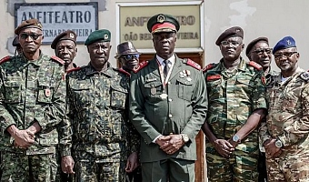 Gen Horta N'Tam, centre, becomes the transitional head of state for one year