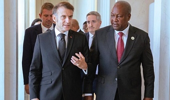 President Emmanuel Macron (left) in a discussion with President John Dramani Mahama during the meeting