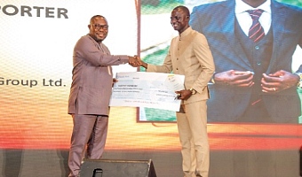 Timothy Ngnenbe (right), Senior Reporter, Daily Graphic, receiving the Best Mining Reporter Award.  Picture: ELVIS NII NOI DOWUONA 