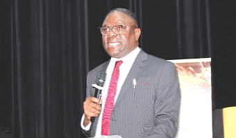 Dr Humphrey Kwesi Ayim Darke (right), outgoing President, AGI, addressing participants in the 65th National Annual General Meeting and Job Fair