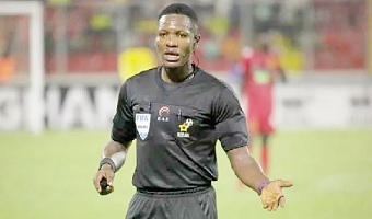 Referee Daniel Laryea