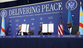 U.S. President Donald Trump, President of the Democratic Republic of the Congo Felix Tshisekedi and President of Rwanda Paul Kagame hold a signed document during a signing ceremony at the U.S. Institute of Peace in Washington, D.C., U.S., December 4, 2025. REUTERS/Kevin Lamarque