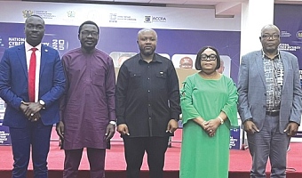 Professor Diyawu Mumin (2nd from left), Executive Director, Centre for National Distance Learning and Open Schooling, Devine Selassie Agbeti (middle), acting Director-General, Cyber Security Authority, and others after the event