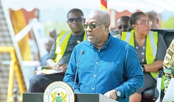 President John Dramani Mahama (right) speaking at the event
