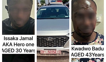 The stolen Hyundai Tucson (centre) and the two suspects after their arrest by the police.