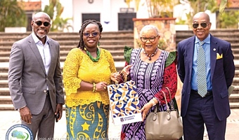 Rev. Dr. Joyce Rosaline Aryee (2nd from right), Board Chairperson, Africa Centre for Nature-Based Climate Action, presenting a gift to Prof. Nana Aba Appiah Amfo, (2nd from left), Vice Chancellor of the University of Ghana, after the meeting. With them are Professor Gordon Awandare (right), Pro-Vice-Chancellor,  University of Ghana, and Kwaku Sakyi-Addo (left), a board member of AC4NCA.