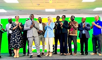 Richard Gyan-Mensah (2nd from left), Deputy Minister of Energy and Green Transition,  speaking at the launch of the initiative. With him are other dignitaries at the event