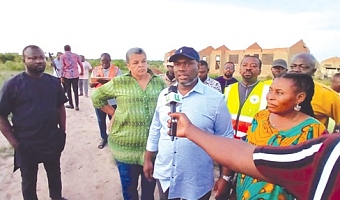 Kenneth Gilbert Adjei (arrowed), Minister of Works, Housing and Water Resources, briefing the media at Kpotame in the South Tongu Municipality.