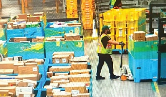 • Workers moving products during Cyber Monday at Amazon's fulfilment center in Robbinsville, New Jersey, U.S