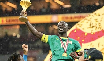 Sadio Mané with the 2025 AFCON trophy