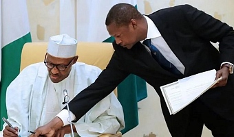Abubakar Malami (right), who is married to the daughter of former President Muhammadu Buhari (left), was widely seen as the most influential minister in the last government