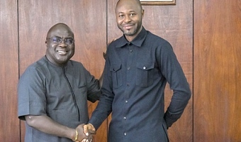 Julius Debrah (left), Chief of Staff, with Latif Abubakar after their meeting
