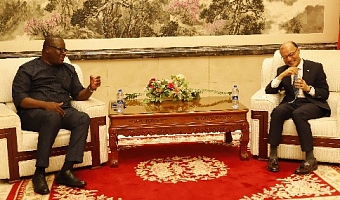 Theophilus Yartey (left), Editor, Graphic, explaining a point to Tong Defa, Ambassador of China to Ghana, during the meeting. Picture: EDNA SALVO KOTEY