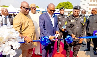 President John Dramani Mahama (middle) inaugurating the pickups before handing them over to the Ghana Police Service. Those with him are Ebenezer Okletey Terlabi (left), Deputy Minister for the Interior; Christian Tetteh Yohuno (right), Inspector General of Police, and other dignitaries 