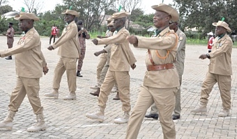  Emmanuel Darkey (2nd from right), 103-year-old World War II veteran, arriving at the parade ground