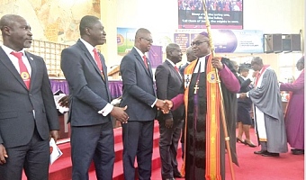 Most Rev. Prof. Johnson Kwabena Asamoah-Gyadu, Presiding Bishop of the Methodist Church Ghana, congratulating the new Connexional executives of Methodist Fellowship of Evangelists after their induction at Bethany Methodist Church, Dzorwulu