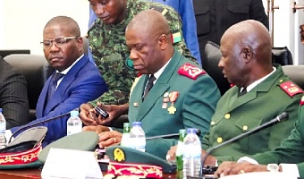 Major-General Horta Inta-a (middle), Guinea-Bissau's transitional President,  at a press conference in Bissau