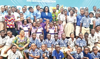 Dr Agnes Naa Momo Lartey (arrowed), Minister for Gender, Children and Social Protection, with some of the schools that participated in the World Children's Day celebration which also convened the Seventh Sitting of the National Children's Parliament
