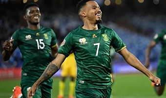 South Africa's Oswin Appollis celebrates scoring his team's winner from the penalty spot 