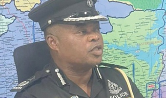 DCOP Theodore Hlormenu, Director of Operations of the Ghana Police Service, briefing the media