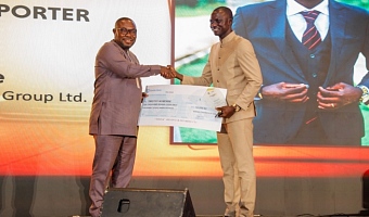 Timothy Ngnenbe (right), Senior Reporter, Daily Graphic, receiving the Best Mining Reporter Award.  Picture: ELVIS NII NOI DOWUONA 
