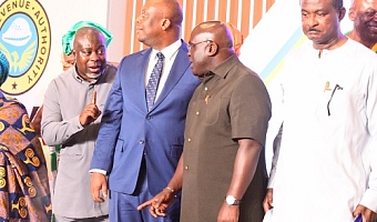 Julius Debrah (2nd from right), Chief of Staff, Office of the President, interacting with Anthony K. Sarpong (extreme left), acting Commissioner-General, GRA, after the launch of the Sustainable National Tax in Accra. Those with them are George Kweku Ricketts-Hagan (right), Board Chairman, GRA, and Thomas Nyarko Ampem (2nd from left), Deputy Minister of Finance. Picture: SAMUEL TEI ADANO