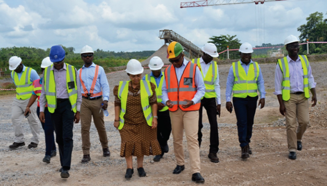 Madam Lulama Zingwana (middle) and her entourage being led by the Managing Director of the mine (right), to tour some operational areas of Iduapriem Mine Traditional rulers urged to help stop illegal mining