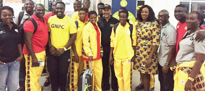 Officials of GNPC, led by its CEO, Alex Mould (in cap), pose with members of Ghana’s contingent before the left Accra for Rio Team Ghana lands in Rio
