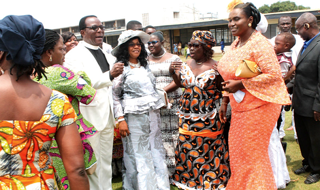 Pastor Daniel Sackey (3rd left), Resident Pastor of Pentecost International Worship Centre (PIWC), and his wife, Mrs Mary Sackey (4th left), interacting with some church members after the farewell service. Picture: EDNA ADU-SERWAA Pastor Daniel Sackey (3rd left), Resident Pastor of Pentecost International Worship Centre (PIWC), and his wife, Mrs Mary Sackey (4th left), interacting with some church members after the farewell service. Picture: EDNA ADU-SERWAA