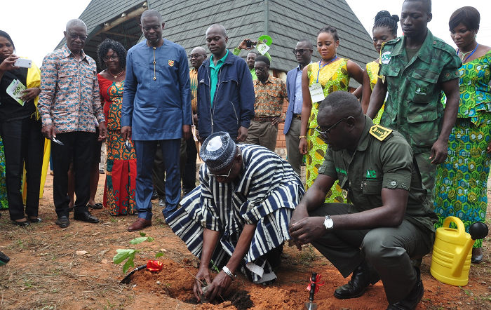 Mr Bugri Tia planting a seedling to symbolise the commencement of the construction of the Accra Eco Park. With him are Nii Osa Mills (2nd left) and Mr Samuel Afari Dartey (squatting) Mr Bugri Tia planting a seedling to symbolise the commencement of the construction of the Accra Eco Park. With him are Nii Osa Mills (2nd left) and Mr Samuel Afari Dartey (squatting)
