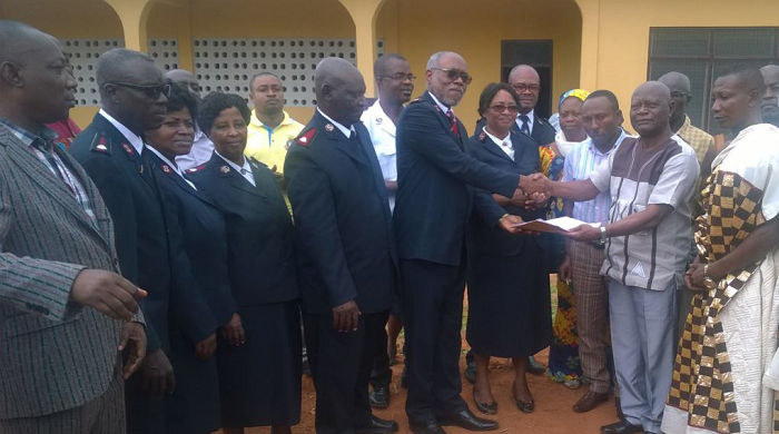 Nana Amoah Gyasi (right), the Agona Adontenhene, presenting the land documents to the Territorial Commander of the Salvation Army Church, Col Joseph Lukau Nana Amoah Gyasi (right), the Agona Adontenhene, presenting the land documents to the Territorial Commander of the Salvation Army Church, Col Joseph Lukau