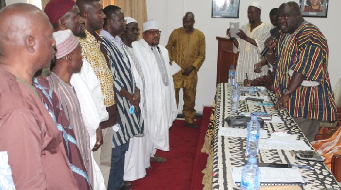Mr Julius Debrah (right), Chief of Staff, performing the official  inauguration of FISHSIG during the ceremony. Picture: EDNA ADU-SERWAA