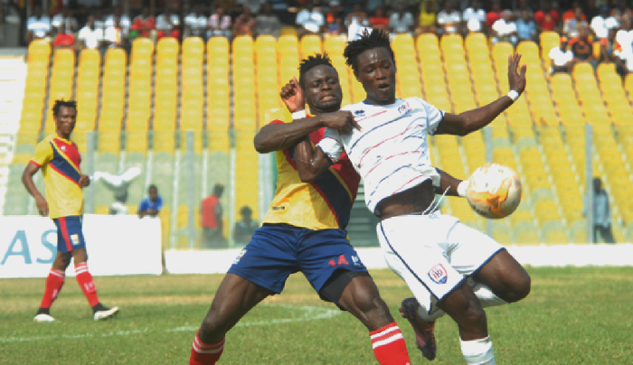 Inter Allies Ackwei Wahab blocks Hearts’ Cosmos Dauda from getting to the ball during their match at the Accra Sports Stadium yesterday. Picture: emmanuel quaye Inter Allies Ackwei Wahab blocks Hearts’ Cosmos Dauda from getting to the ball during their match at the Accra Sports Stadium yesterday. Picture: emmanuel quaye