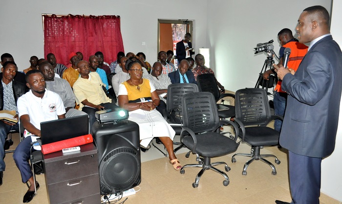 Dr Eric Oduro Osae explaining a point at the training session