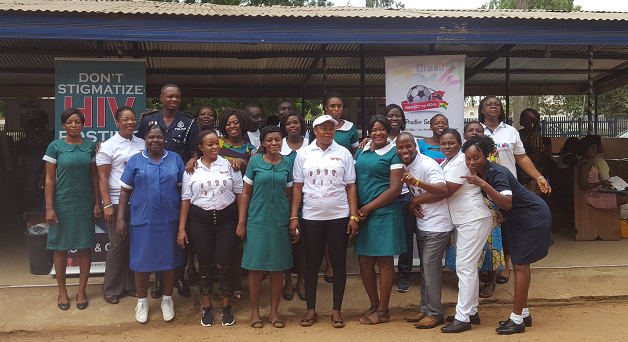 H2H ambassodors and officials of the Police Hospital pose for the camera Women urged to go beyond HIV testing