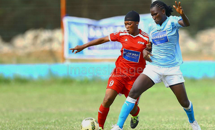 Immigration’s Agnes Quaye (left), slugs it out with Patience Kpobi of Police in their game yesterday. PICTURE: IMAGES IMAGE Immigration’s Agnes Quaye (left), slugs it out with Patience Kpobi of Police in their game yesterday. PICTURE: IMAGES IMAGE